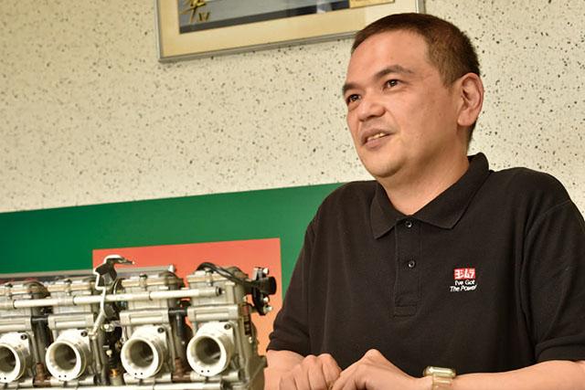 ヨシムラジャパン 設計部係長 川口裕介<br>1999年入社、エンジンパーツ全般の開発と数々のヨシムラコンプリートマシンの製作に携わる。「Z1というバイクは構造的に若いスタッフにとって良い教材でもあります」と語る。